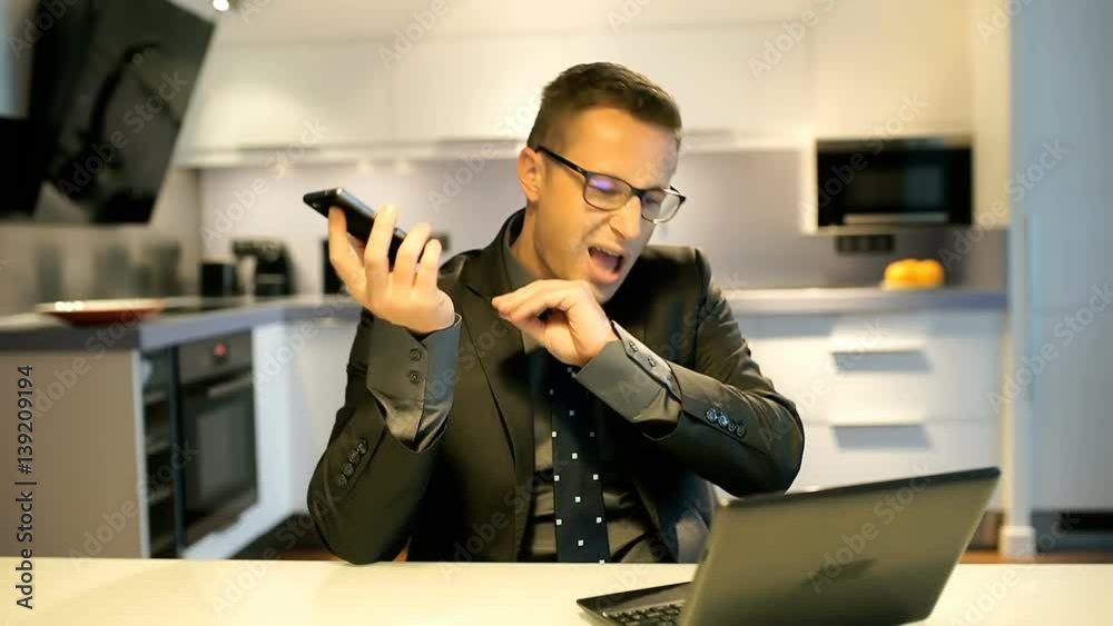 Bored businessman talking on cellphone and mimic someone
Bored businessman talking on cellphone and mimic someone