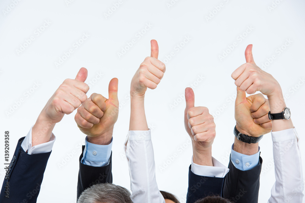 People showing thumbs up