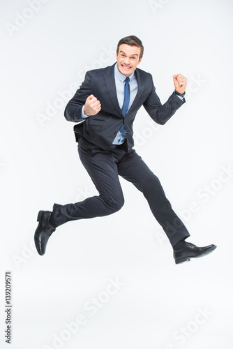 Young excited businessman © LIGHTFIELD STUDIOS