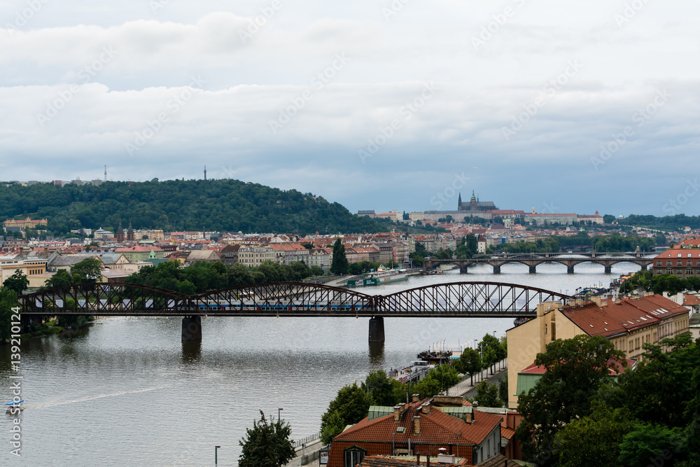 View to the Vltava the river and briges of Prague from Vysegrad rock, Czech Republic at summer with clouds on background