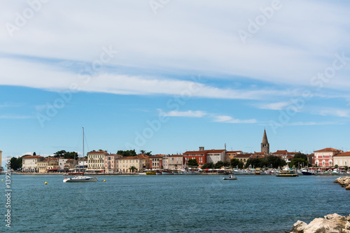 View of the old district, basilica and the bay of Porec, old Adriatic town in Croatia © Anna
