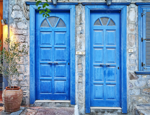 Greece, Hydra island, two blue doors side by side