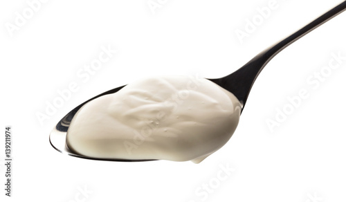 sour cream in a spoon