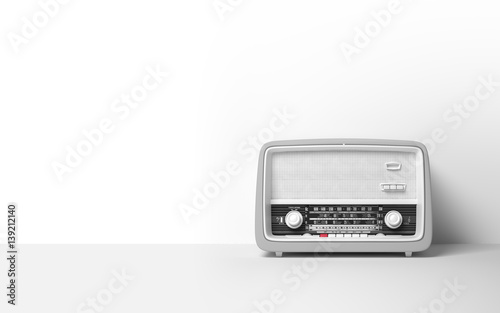 Vintage antique retro old radio on background photo