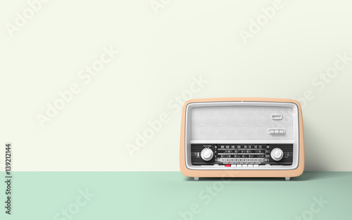 Vintage antique retro old radio on background photo