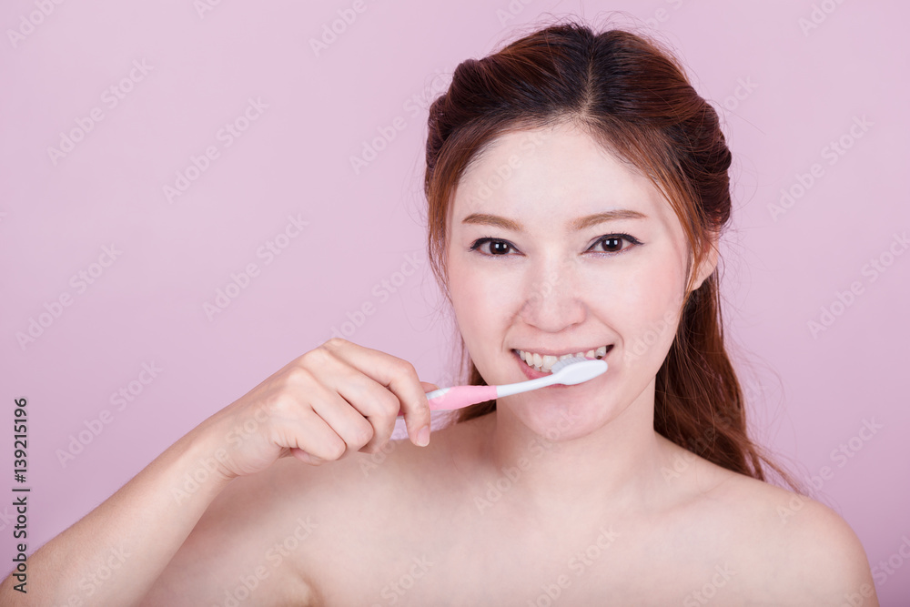 happy beautiful woman brushing her teeth happy beautiful woman brushing her teeth