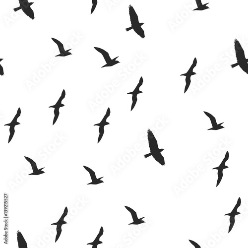 Colorful silhouettes of flying birds seamless pattern © Евгения Мухитова