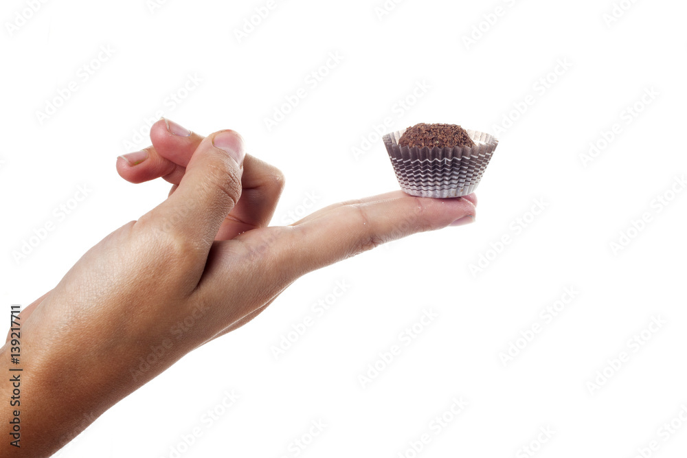 Traditional candy from Brazil called brigadeiro over white background Traditional candy from Brazil called brigadeiro over white background