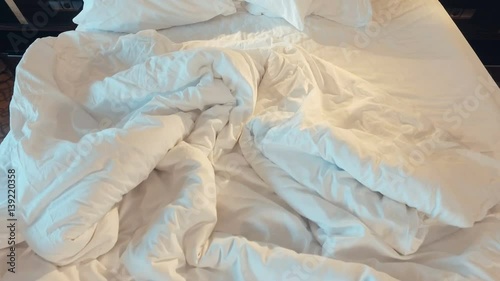 Wallpaper Mural crumpled bed in a hotel or at home. camcorder Motion Torontodigital.ca