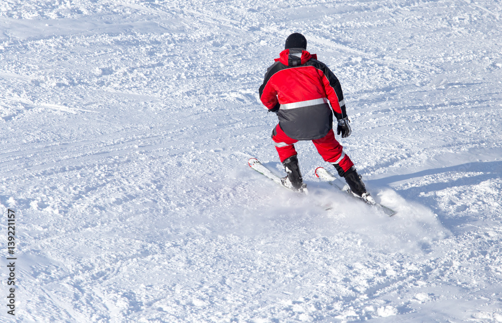 man skiing in winter