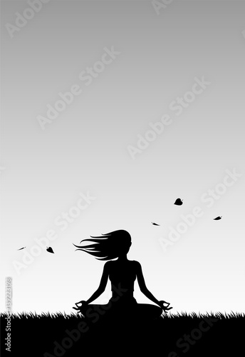Yoga at a Windy Sunset. Girl Relaxing doing Yoga at a Windy Sunset. Sİlhouette.
