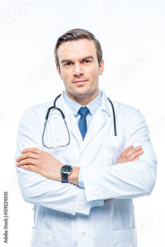 Male doctor with stethoscope © LIGHTFIELD STUDIOS