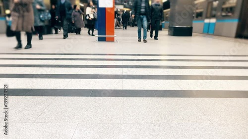 Wallpaper Mural Unrecognizable passengers on the station of modern subway. 4K video Torontodigital.ca