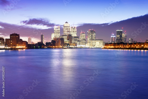 UK, London, skyline with Canary Wharf skyscrapers at dawn