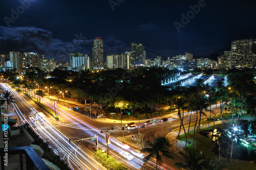 Look from above at highways crossing night city © IVASHstudio