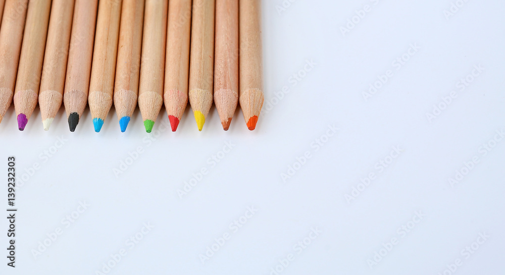 Fototapeta premium colored pencils on white background