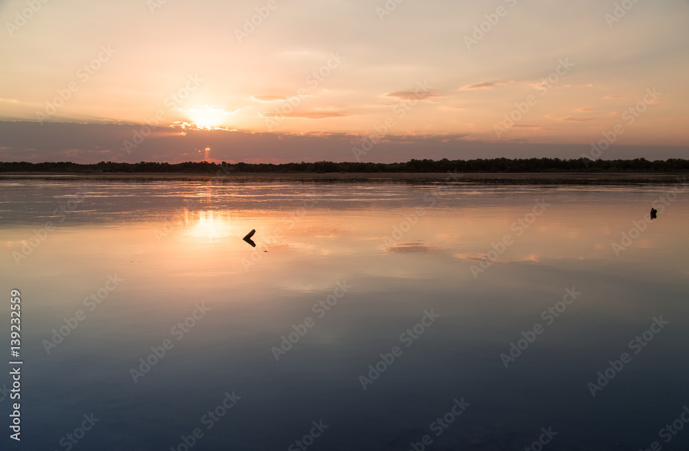 sunset on the lake as a backdrop