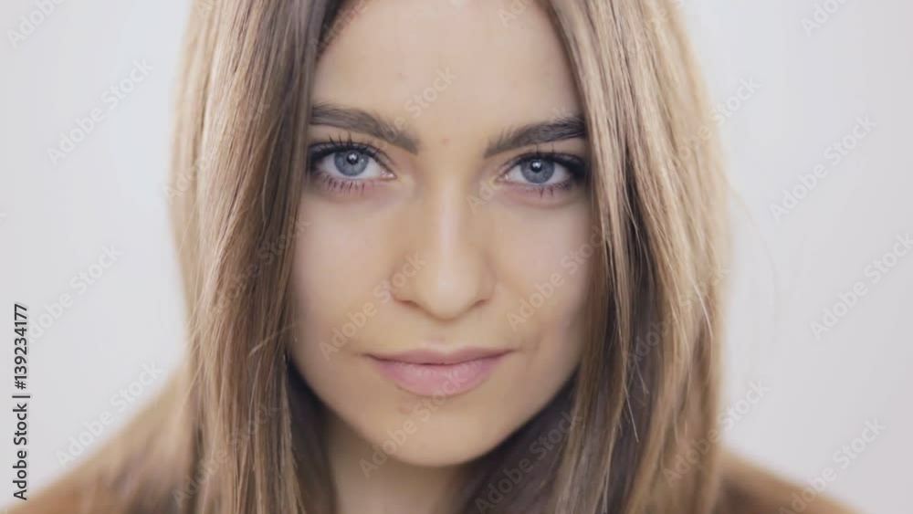 Young woman on white background