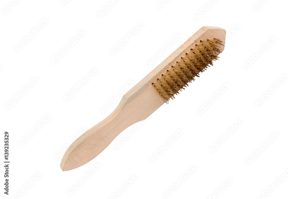 Close-up Brass brush with wooden handle isolated on white Close-up Brass brush with wooden handle isolated on white