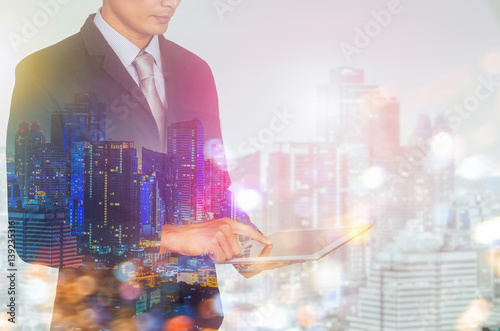 Businessman using digital tablet.