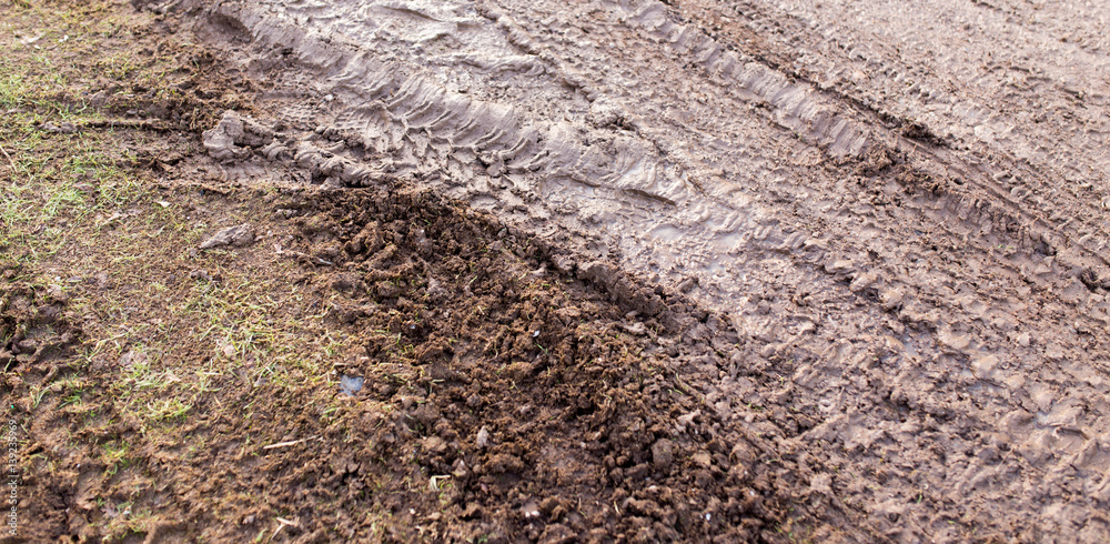 track from a car in a dirty ground track from a car in a dirty ground