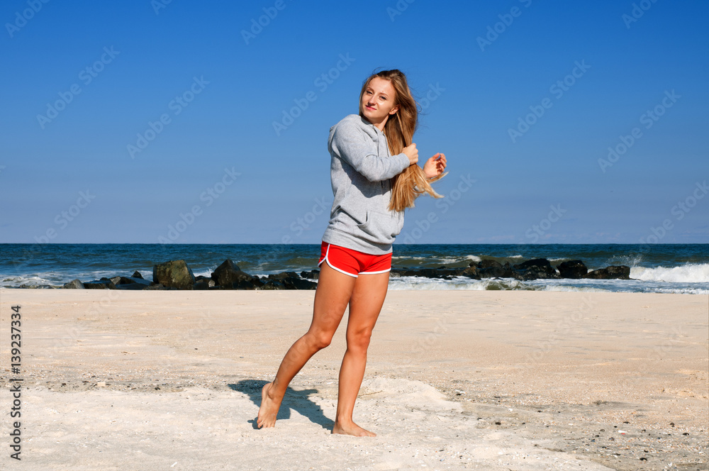 Healthy woman running on the beach, doing sport outdoor, freedom, vacation. Healthy woman running on the beach, doing sport outdoor, freedom, vacation.