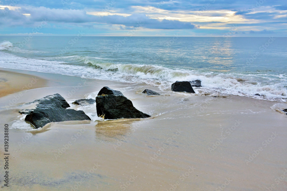 Fototapeta premium Seashore Summer Sunrise Over Rock Jetty