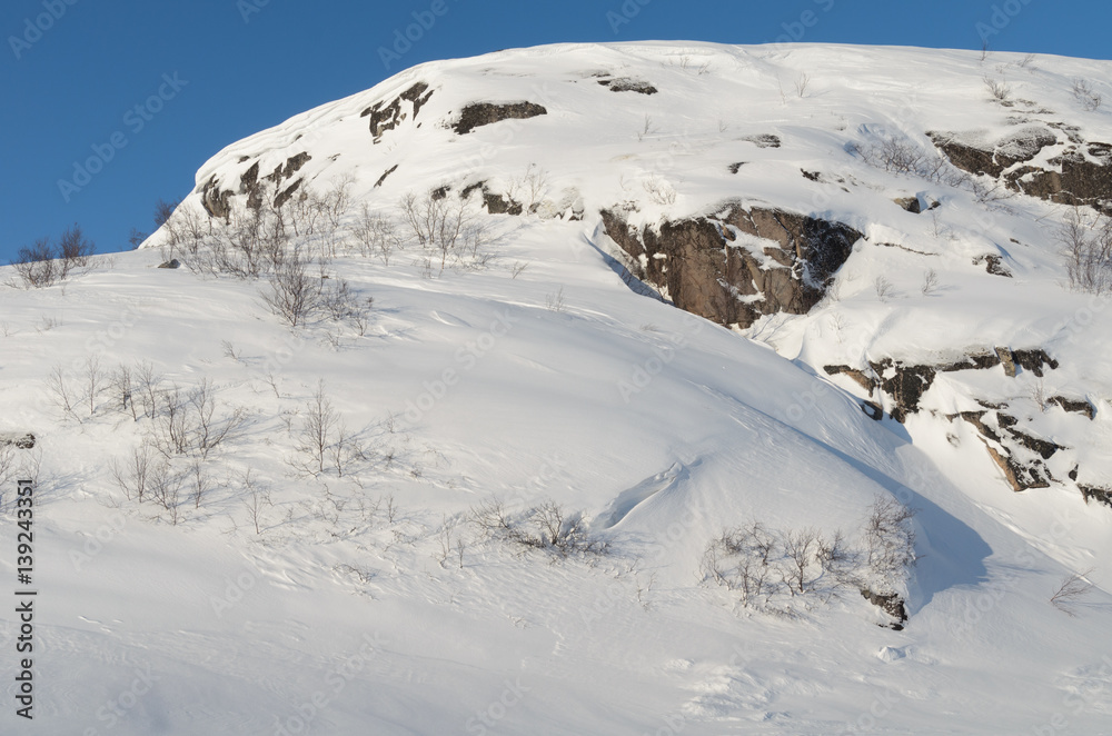 Winter landscape,blue sky,hills.