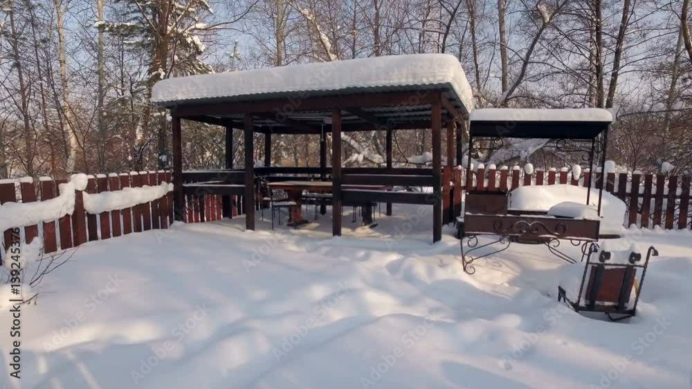 moving shot of pavilion with wooden fence and roaster in country house, forest trees moving shot of pavilion with wooden fence and roaster in country house, forest trees