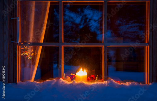 Snowy Wooden Window, Christmas Decoration and Candles