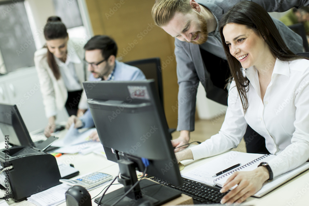 People working in a busy office People working in a busy office