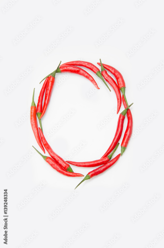Fototapeta premium Bold letter O Latin alphabet of red hot chili pepper on a white background
