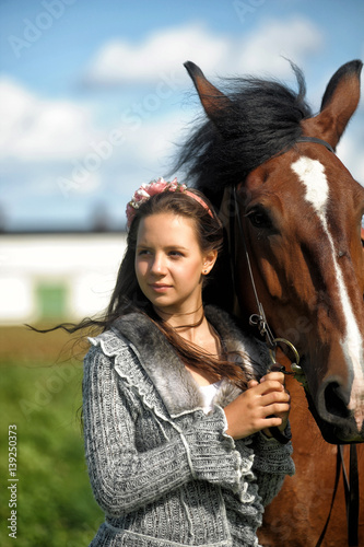 Teen girl with the horse
