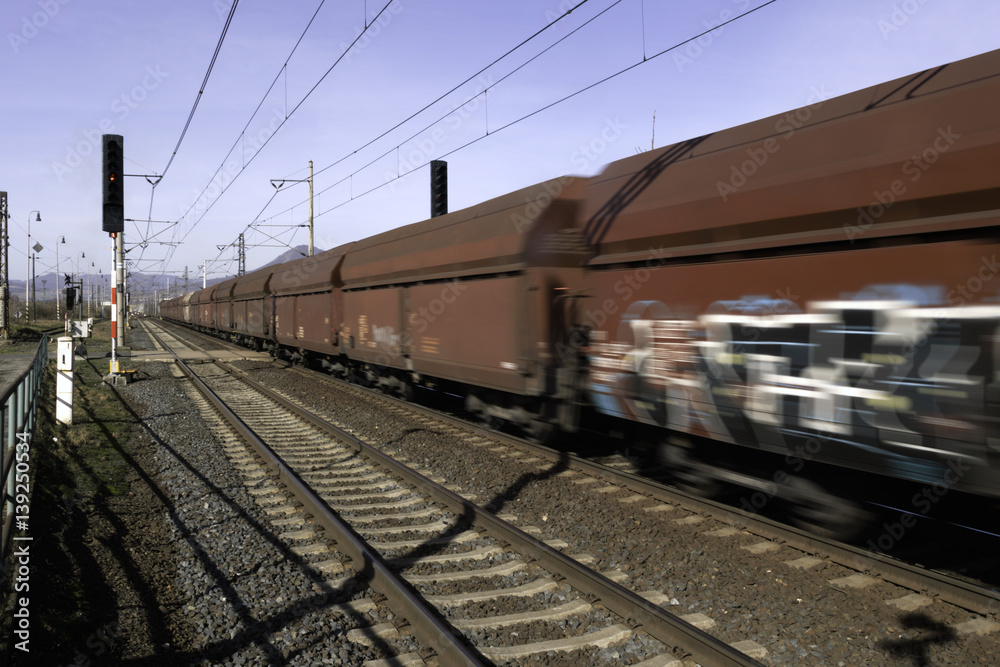 Railroad crossing with gates and road Railroad crossing with gates and road