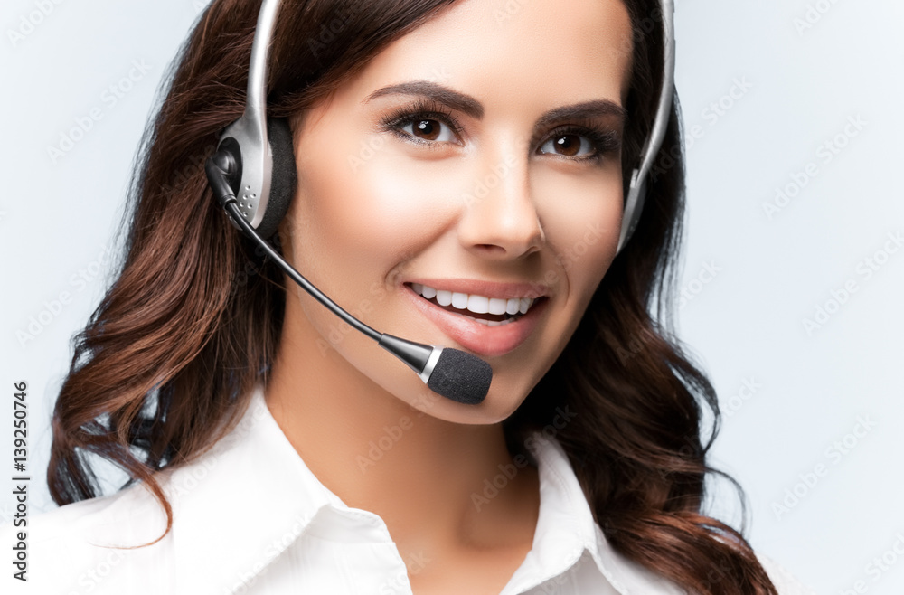 smiling customer support female phone operator in headset smiling customer support female phone operator in headset