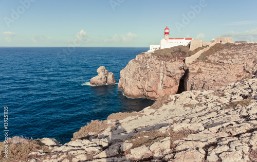 Beacon at Cape St. Vincent, the southwesternmost point of Portugal and of mainland Europe. Edge of the earth. Rocks and the Atlantic ocean. Famous viewpoint in Portugal.