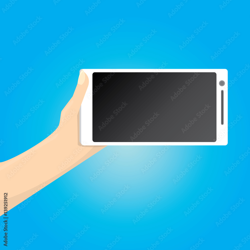 Hand holding white smart phone on blue background. Hand holding white smart phone on blue background.