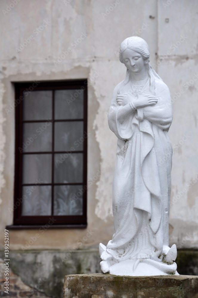 White statue of the Blessed Virgin Mary. Slonim, Grodno region, Belarus.
