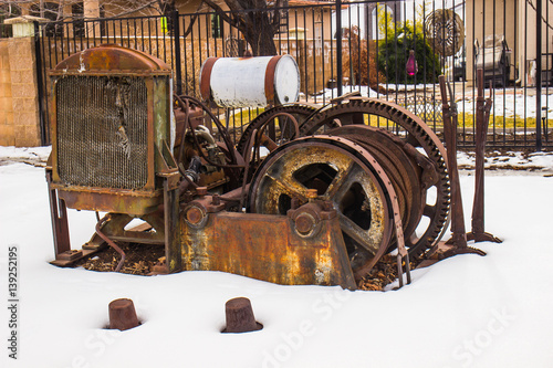 Vintage Rusted Engine & Cable in Winter photo