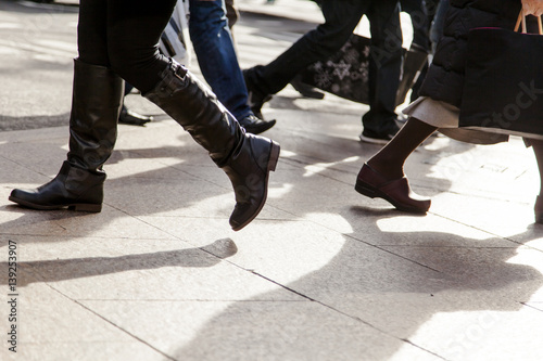 Busy Pedestrian Legs on Street © eldadcarin