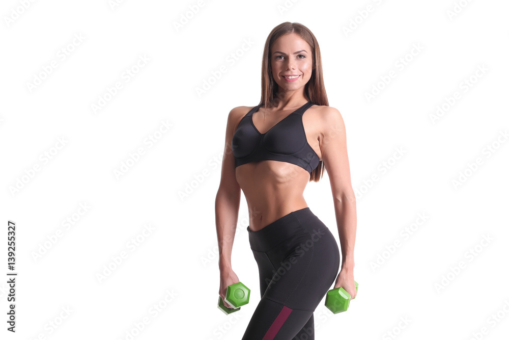 sporty muscular woman working out with dumbbells sporty muscular woman working out with dumbbells