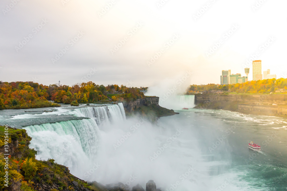 American side of Niagara Falls during sunrise .