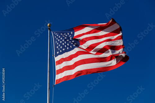 American Flag against blue sky