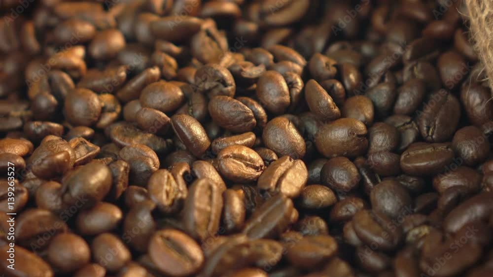 High quality video of rotating coffee beans in 4K High quality video of rotating coffee beans in 4K