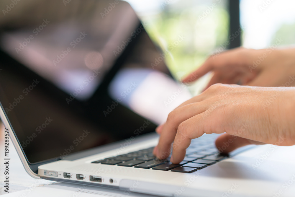 Closeup of business woman hand typing on laptop keyboard . Closeup of business woman hand typing on laptop keyboard .