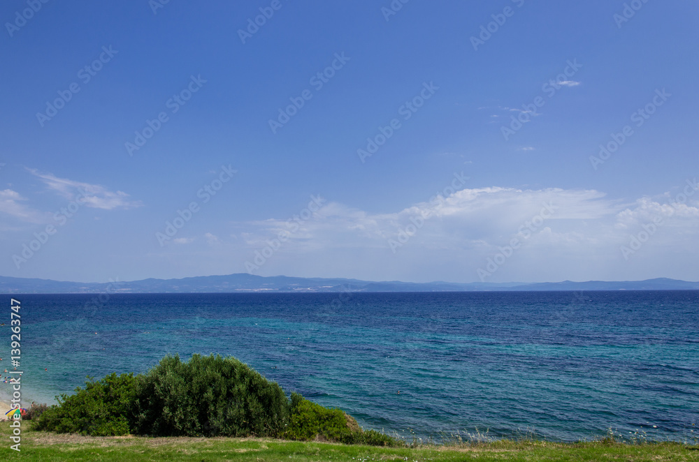 Panorama View on the Blue Ocean from the Green Hill