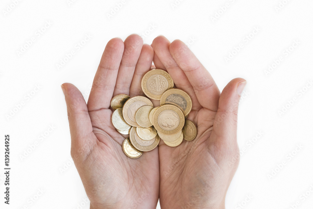 Hands Holding Turkish Coins