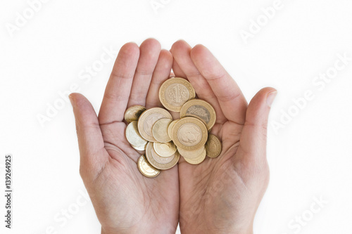 Hands Holding Turkish Coins