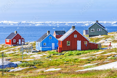 The colorful houses of Rodebay, Greenland. This settlement is located on a small peninsula jutting off the mainland into eastern Disko Bay, 22.5 km north of Ilulissat. It had 46 inhabitants in 2010 photo