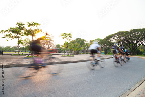 bicycle race in road on sunset